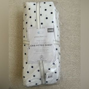 Pottery Barn navy dot crib sheet (chamois)
